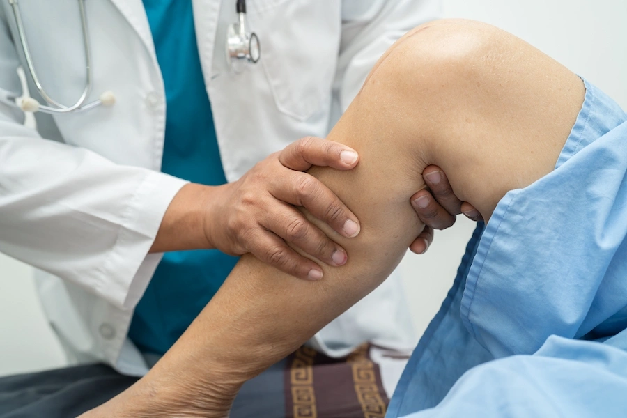 Patient walking comfortably during recovery after GAE knee procedure